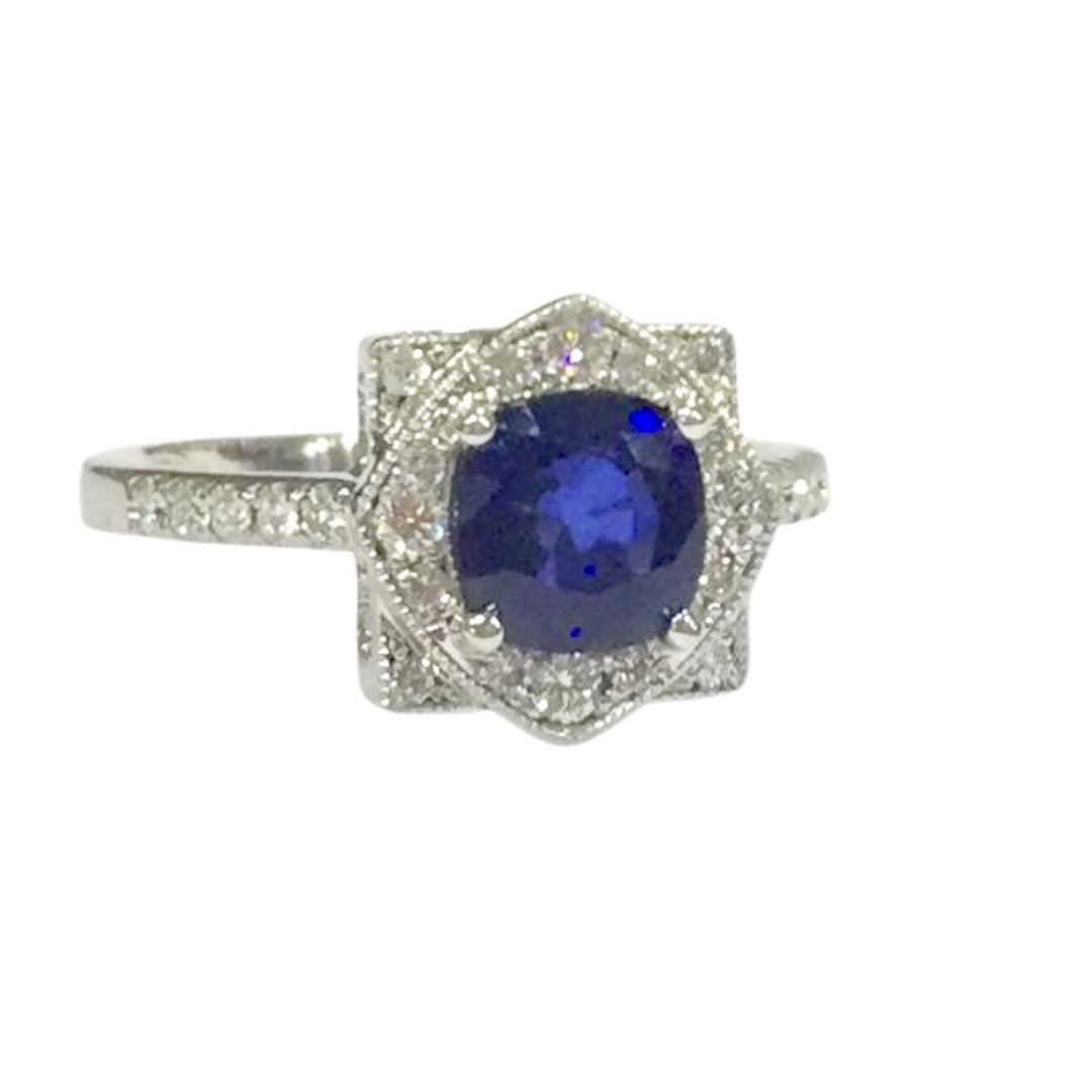 Anillo Platino Zafiro Central y Brillantes