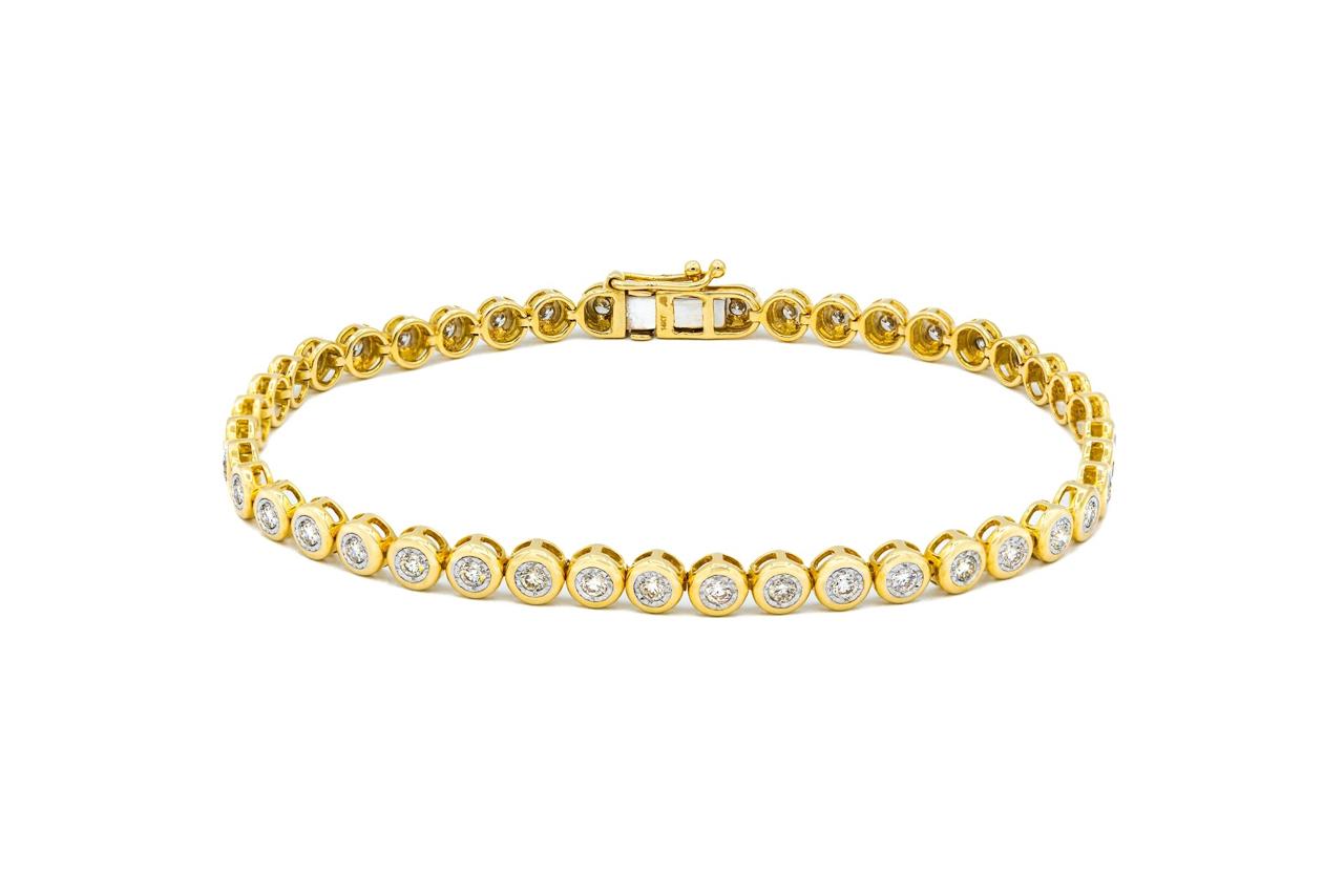 Pulsera Brillantes y Oro Amarillo 14 Kt.